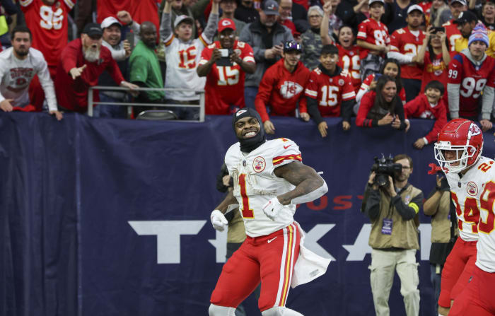 Chiefs running back Jerick McKinnon celebrates after his game-winning touchdown run in overtime beat the Texans.